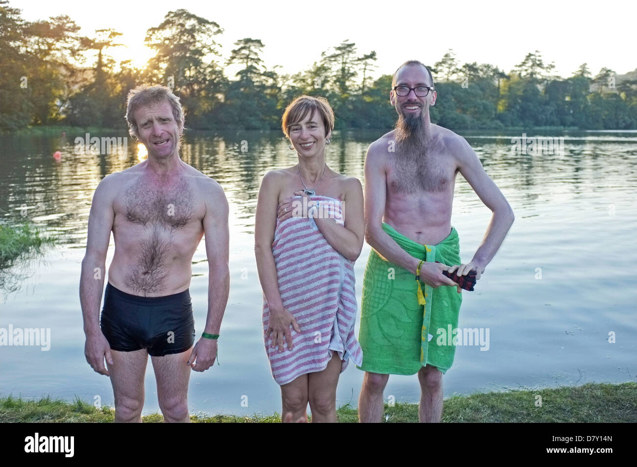 3 keen outdoor swimmers just out of a tidal estuary in St Germans, Cornwall Stock Photo