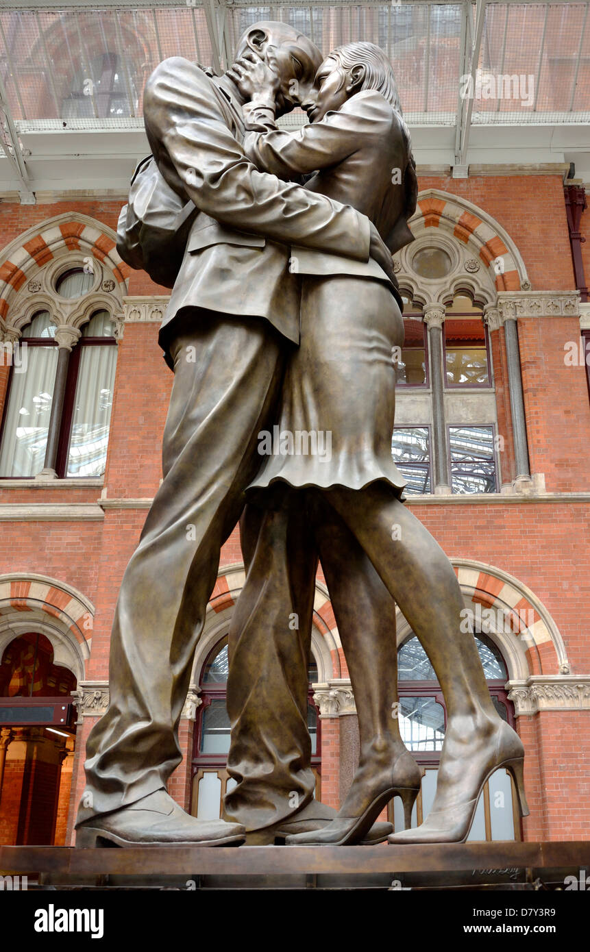 London, England, UK. St Pancras Railway Station. 9m high sculpture 'The Meeting Place' (Paul Day) Stock Photo
