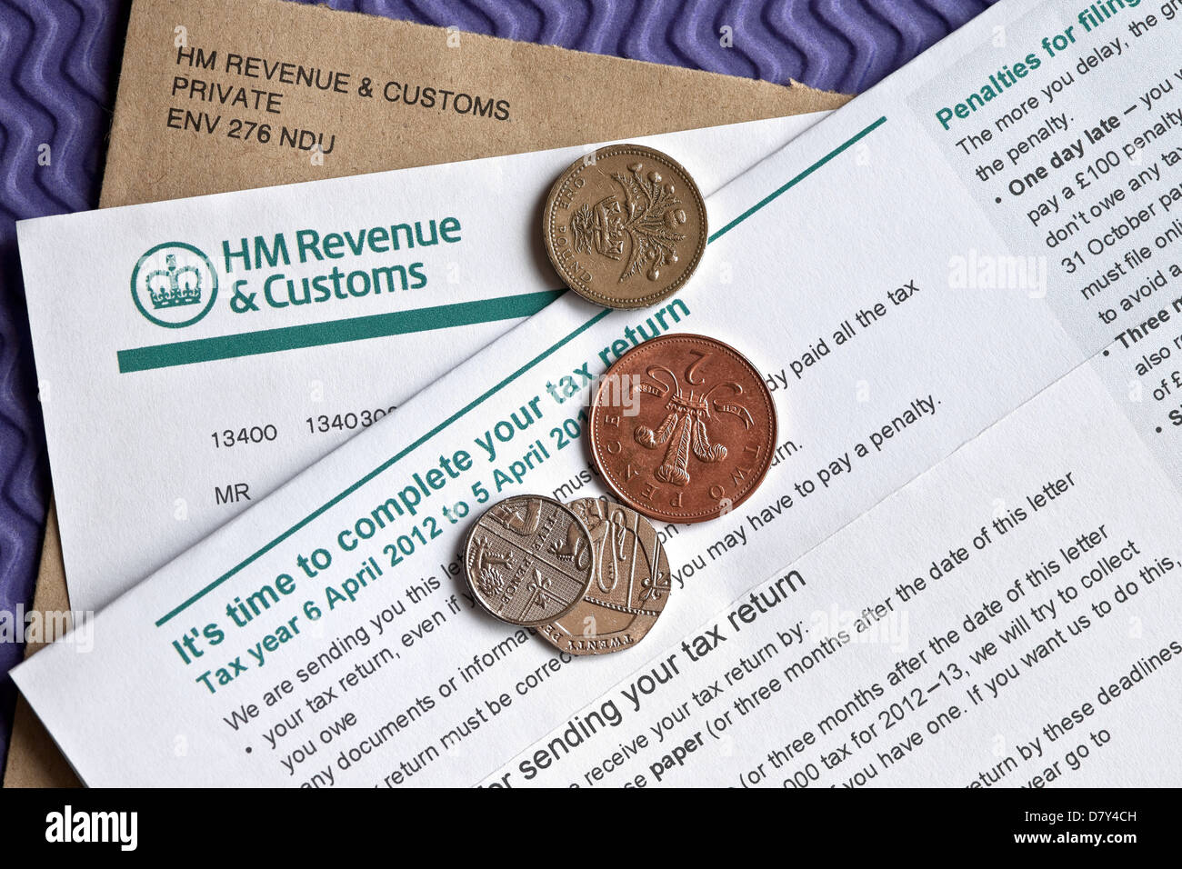 Close up of HMRC HM Revenue and Customs Self Assessment Notice to complete a Tax Return form forms England UK United Kingdom GB Great Britain Stock Photo
