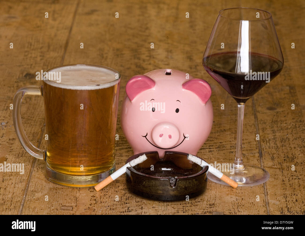 Cigarettes and alcohol on a table Stock Photo