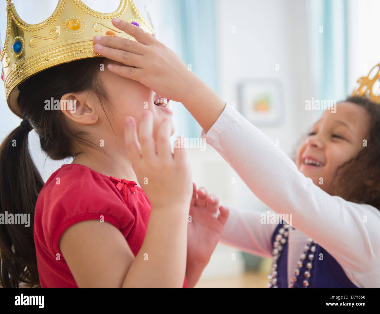 Girls playing dress up together Stock Photo