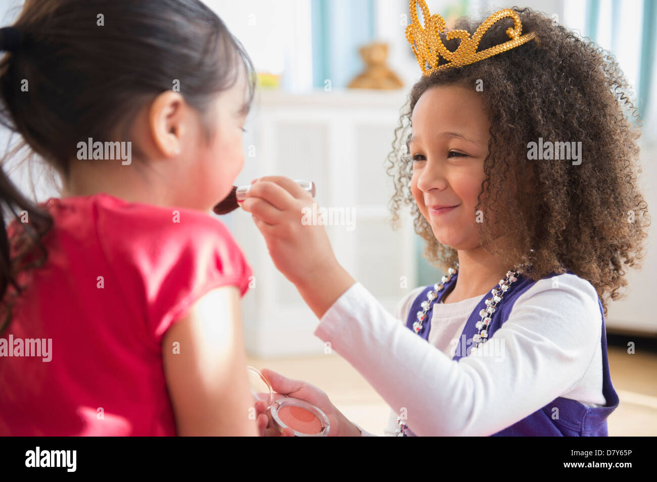 Girls playing dress up together Stock Photo