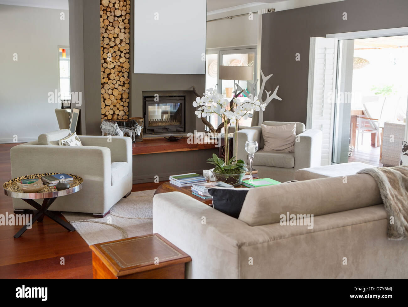 Sofa and armchairs in modern living room Stock Photo - Alamy