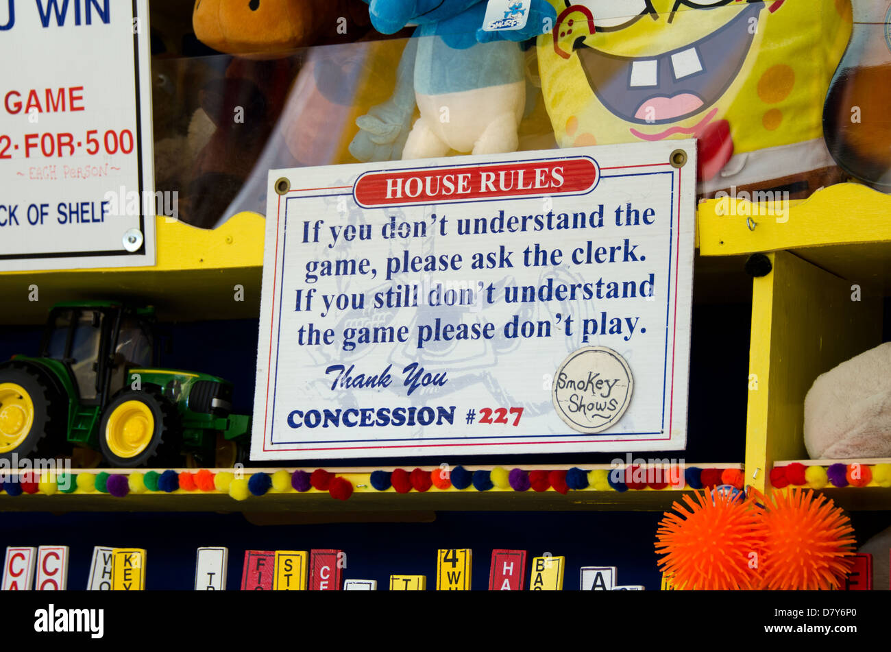 The rules of the game, at a carnival midway. Stock Photo