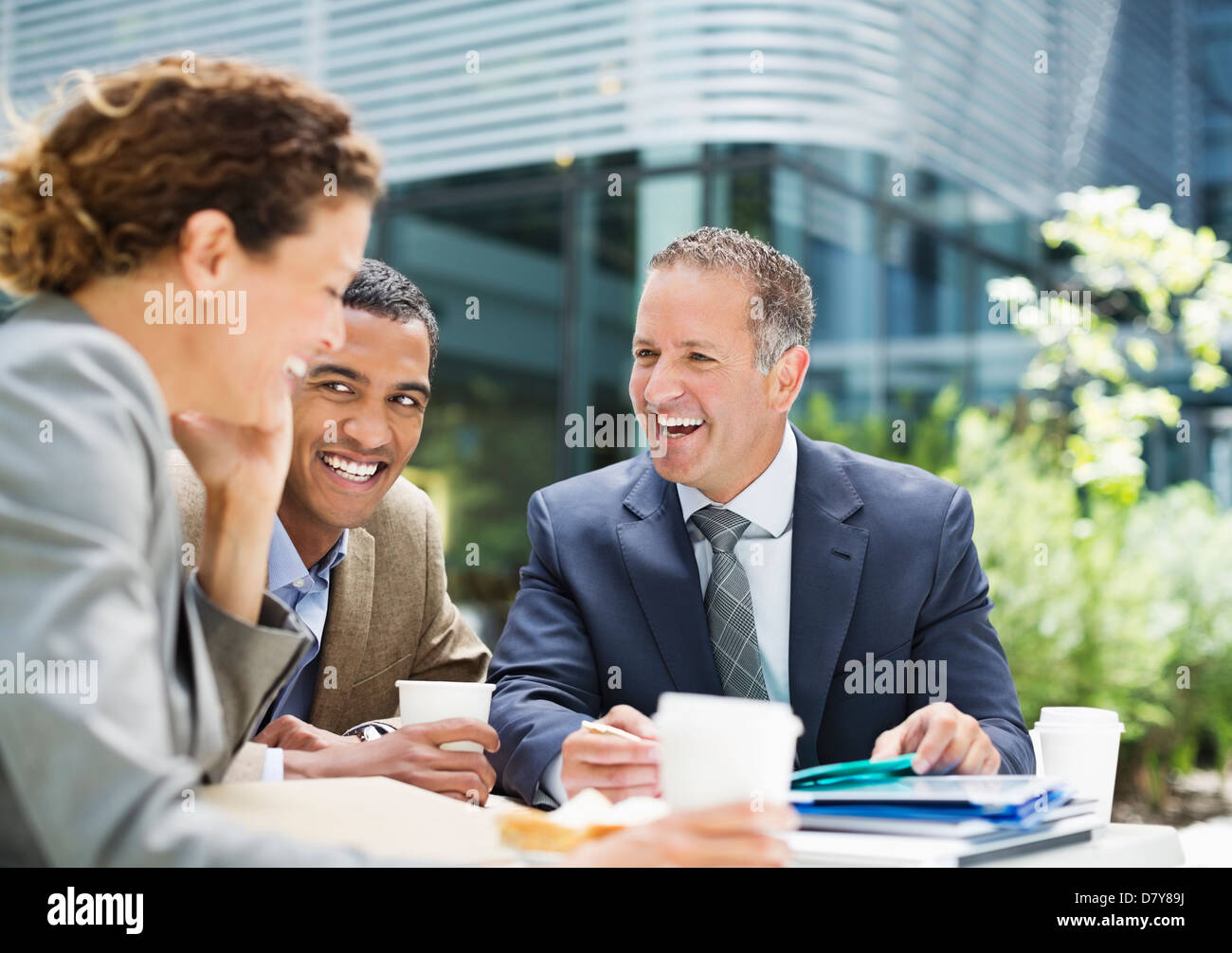 Business people talking outdoors Stock Photo