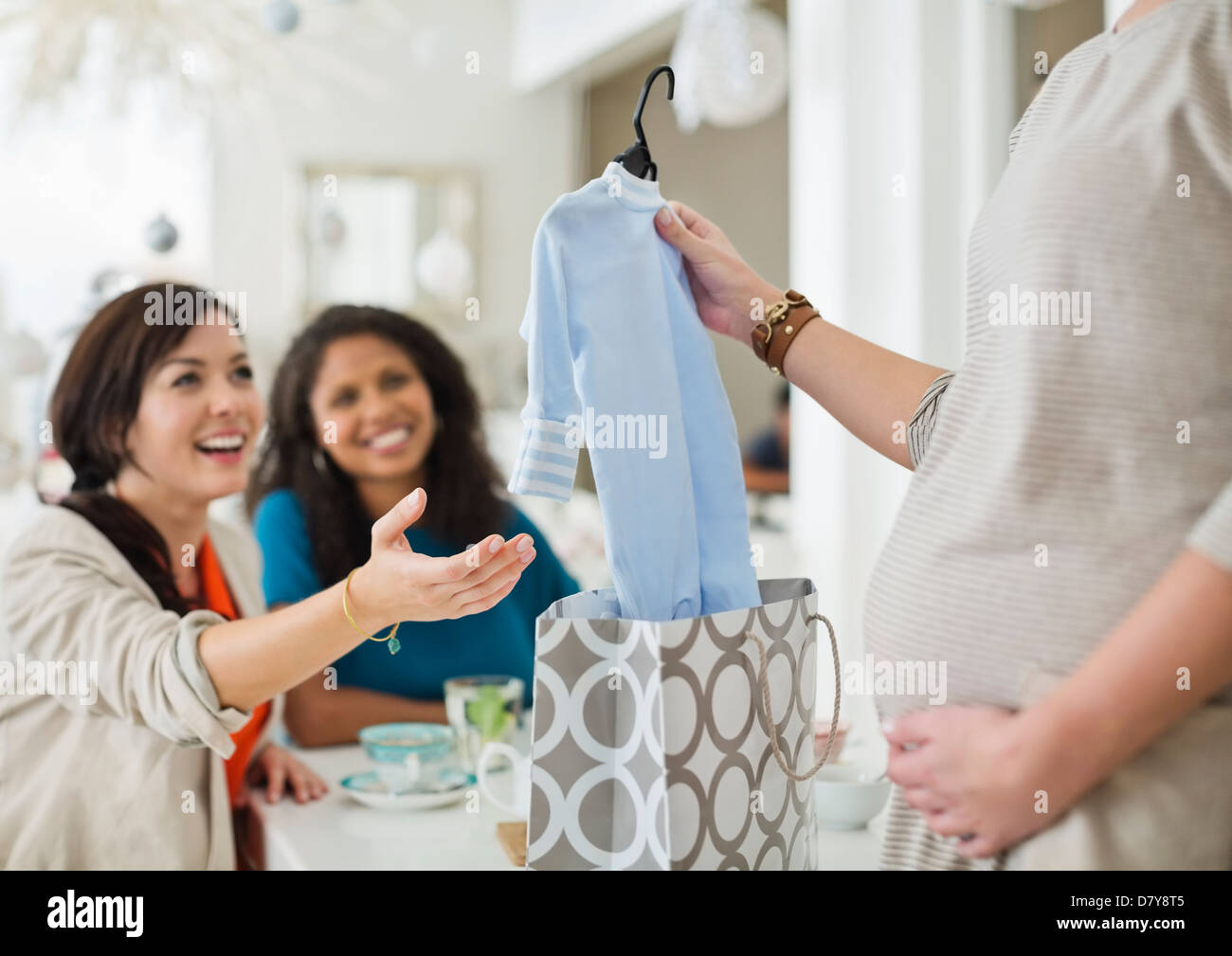 Pregnant woman having baby shower Stock Photo Alamy
