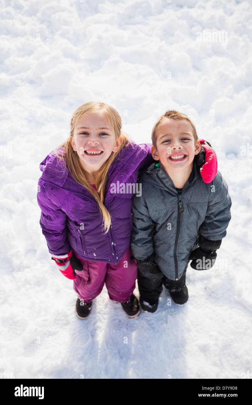 Brother And Sister Standing In Snow High Resolution Stock Photography ...