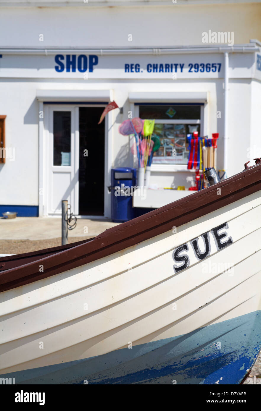 Boat named Sue and Charity shop at Freshwater, Isle of Wight, Hampshire