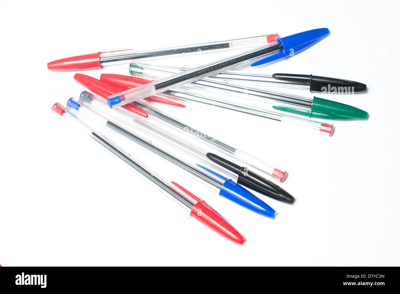 A collection of green, red, black and blue biro pens Stock Photo