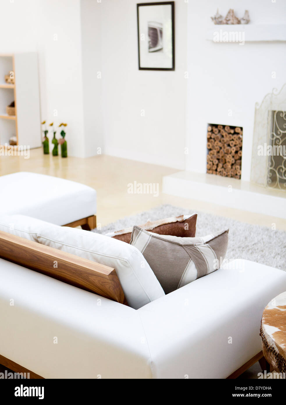 Sofa and fireplace in modern living room Stock Photo Alamy