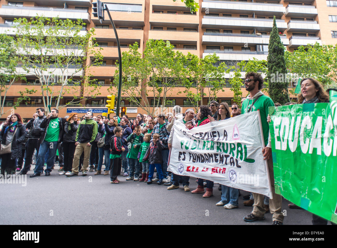 A group of parents, teachers and students protest at Education ...