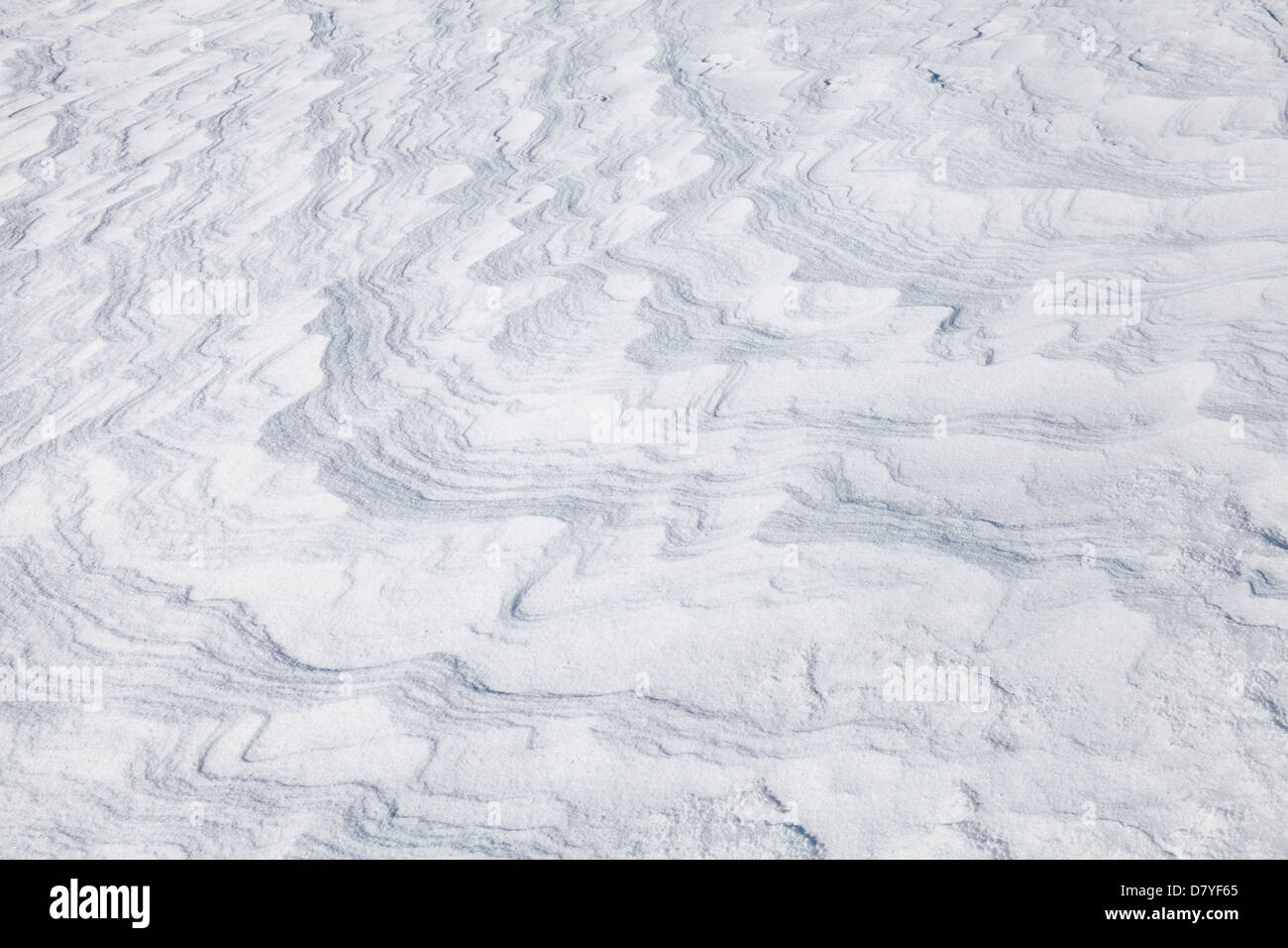 Abstract background texture of snowdrift with nice curved shadows Stock Photo