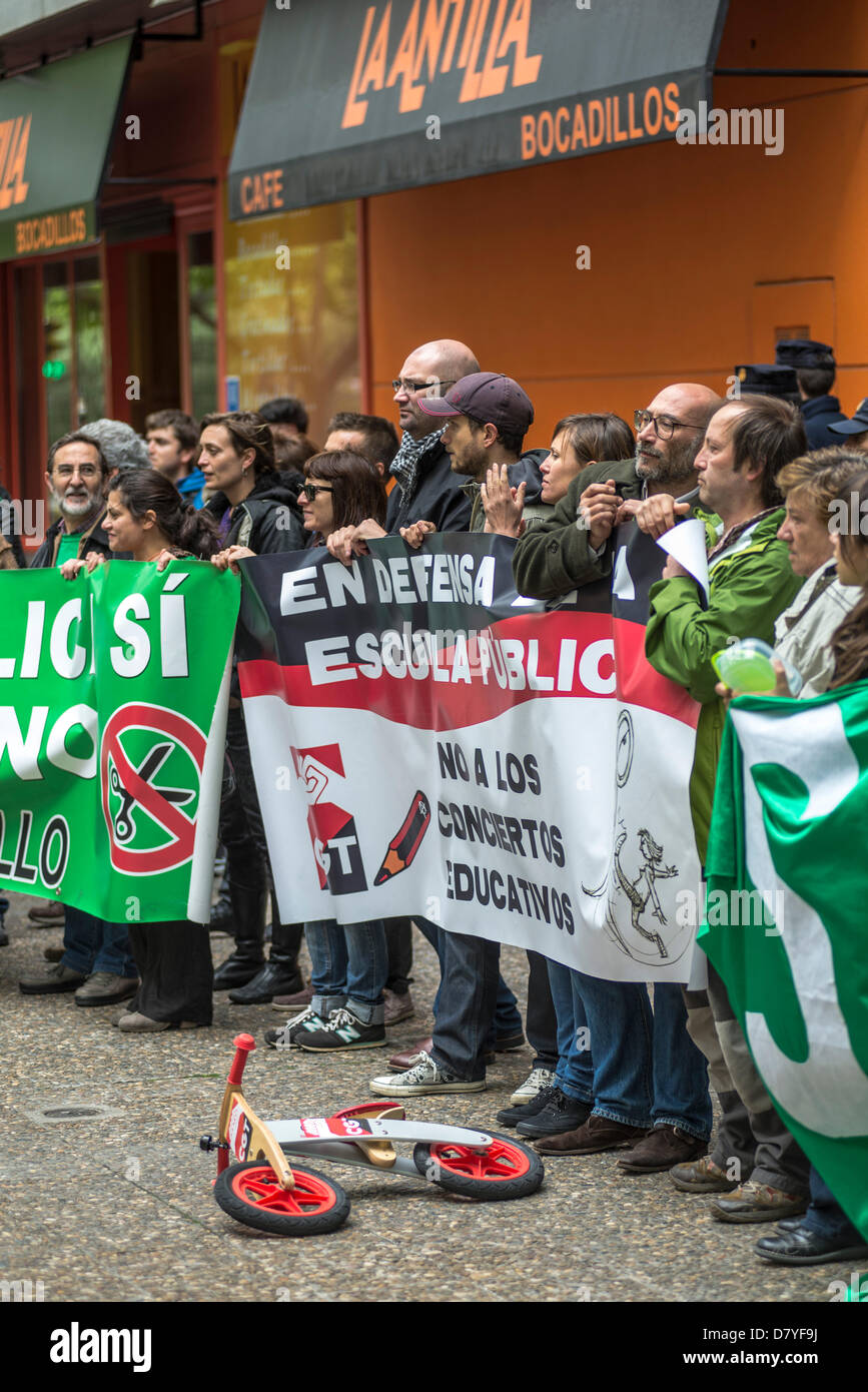 A group of parents, teachers and students protest at Education ...