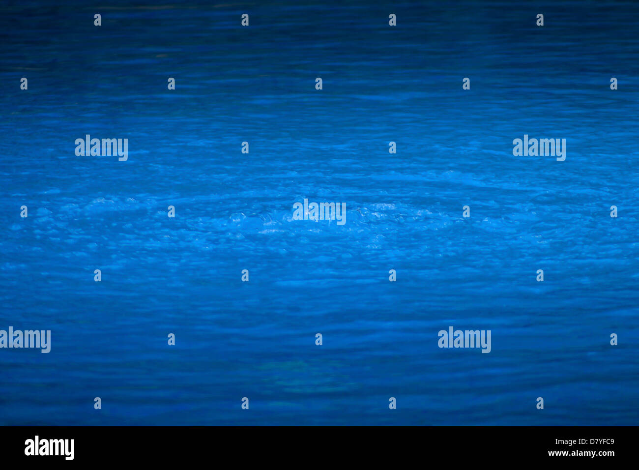 Shot of water bubbling on a swimming pool Stock Photo - Alamy