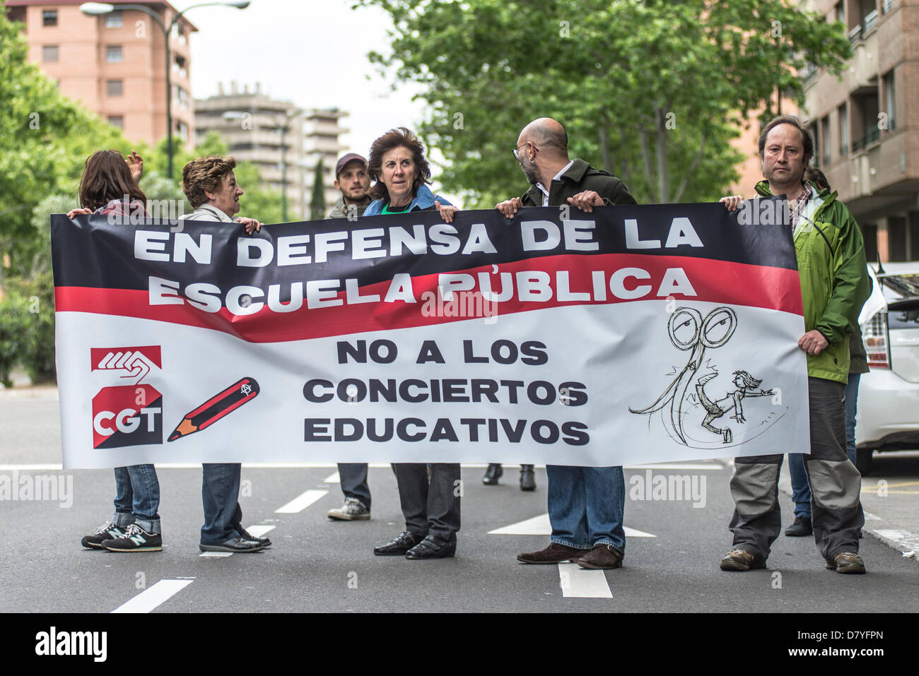 A group of parents, teachers and students protest at Education ...
