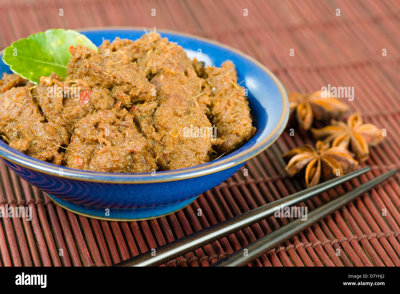 Rendang Daging - Dry beef curry with coconut milk and spices. Traditional Indonesia, Malaysian and Singaporean dish. Stock Photo