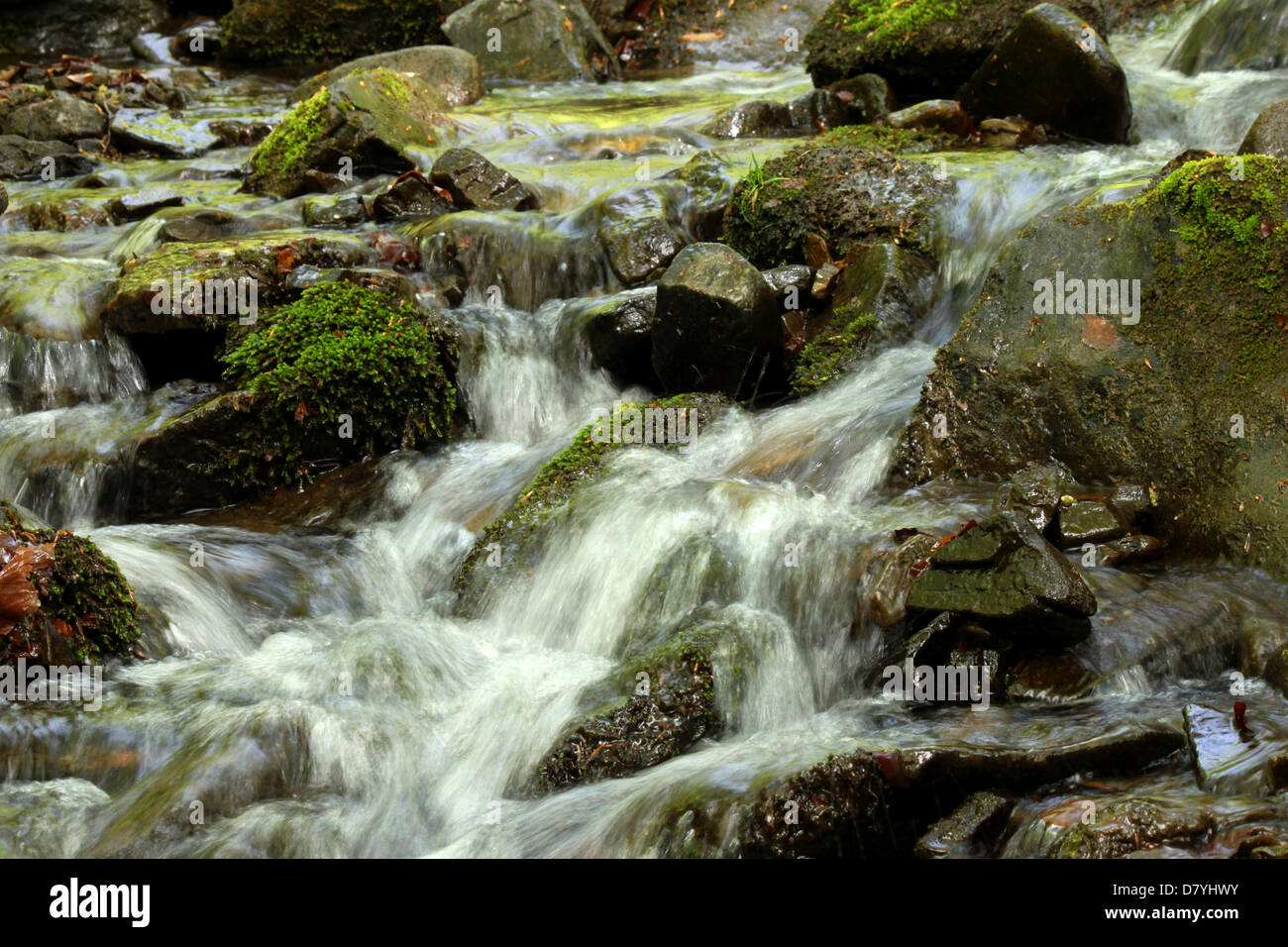 picturesque cascade in mountains Stock Photo