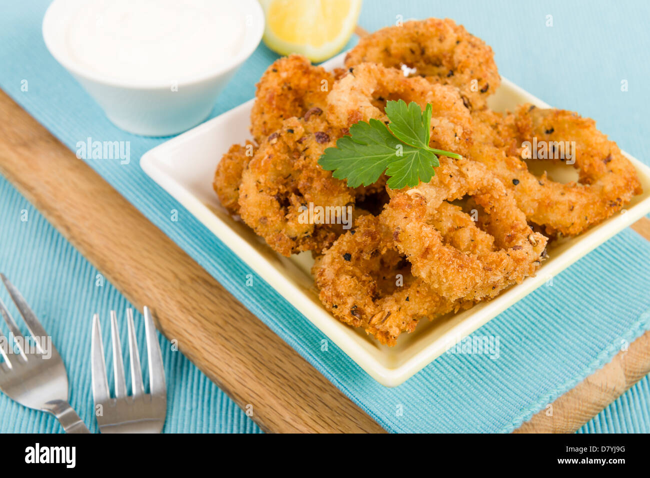 Salt & Pepper Calamari Fried breaded squid rings & garlic mayo Stock