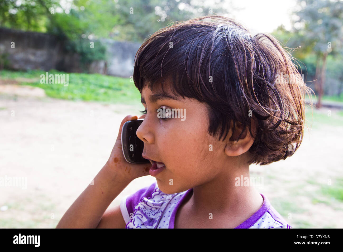 Indian girl talking on a mobile phone in Delhi, India Stock Photo - Alamy