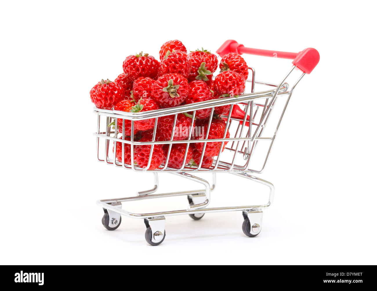 Ripe Red strawberries in shopping cart, on white background Stock Photo