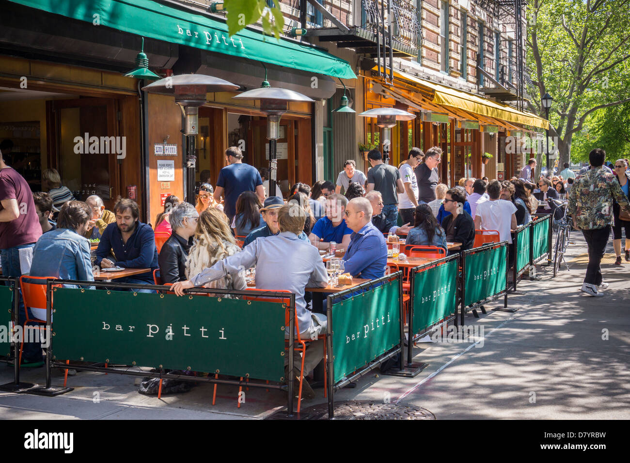 Busy Al Fresco Dining At Bar Pitti Sidewalk Cafe On Sixth Avenue In The New York Neighborhood Of