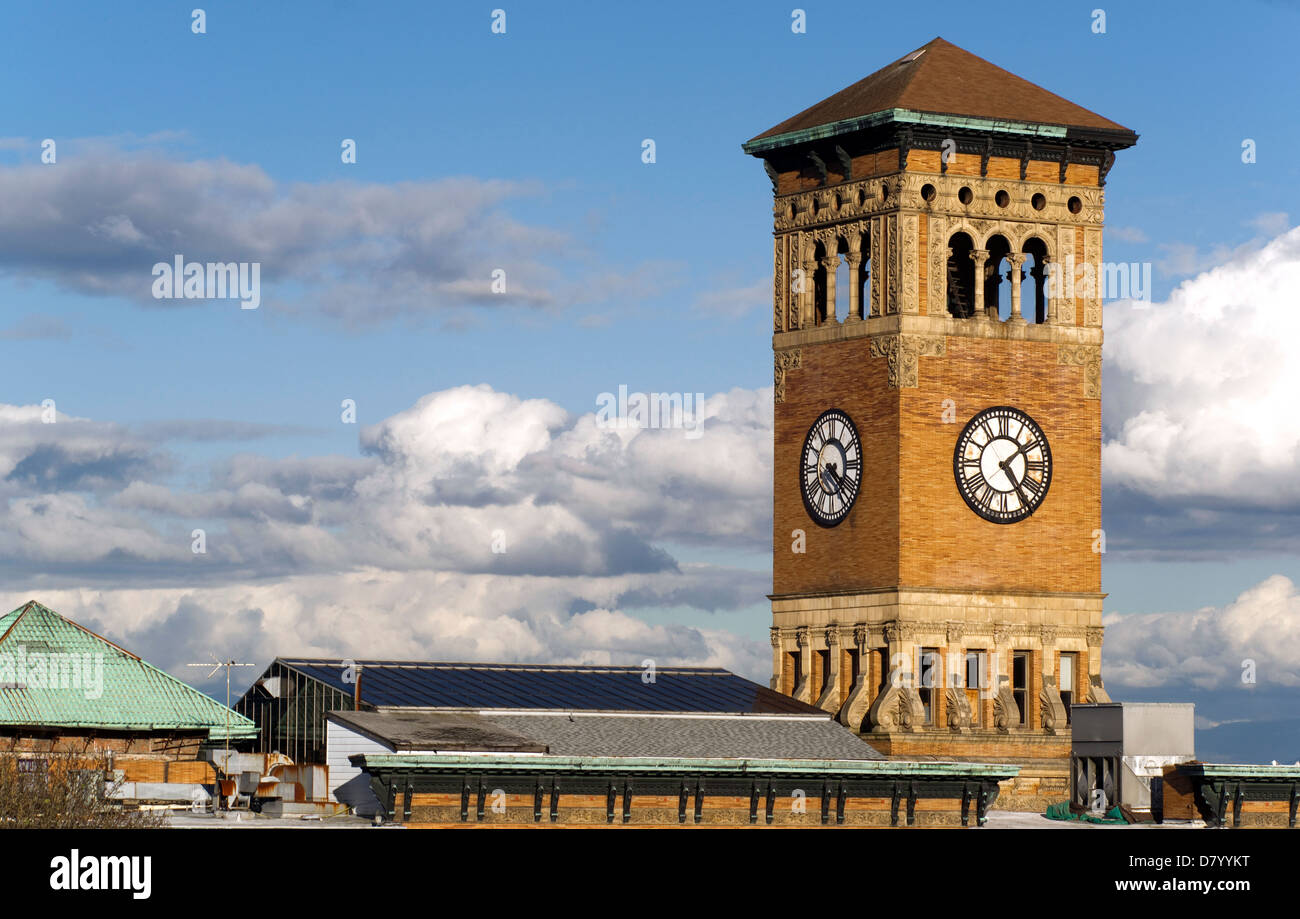 Soft white clouds surround the old City Hall Building in Tacoma Washington, United States Stock Photo