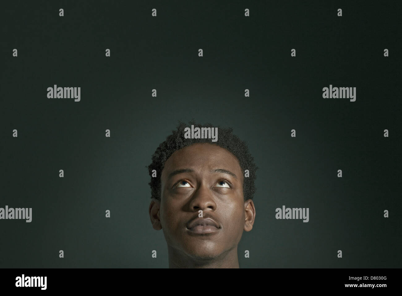 African American man looking up Stock Photo