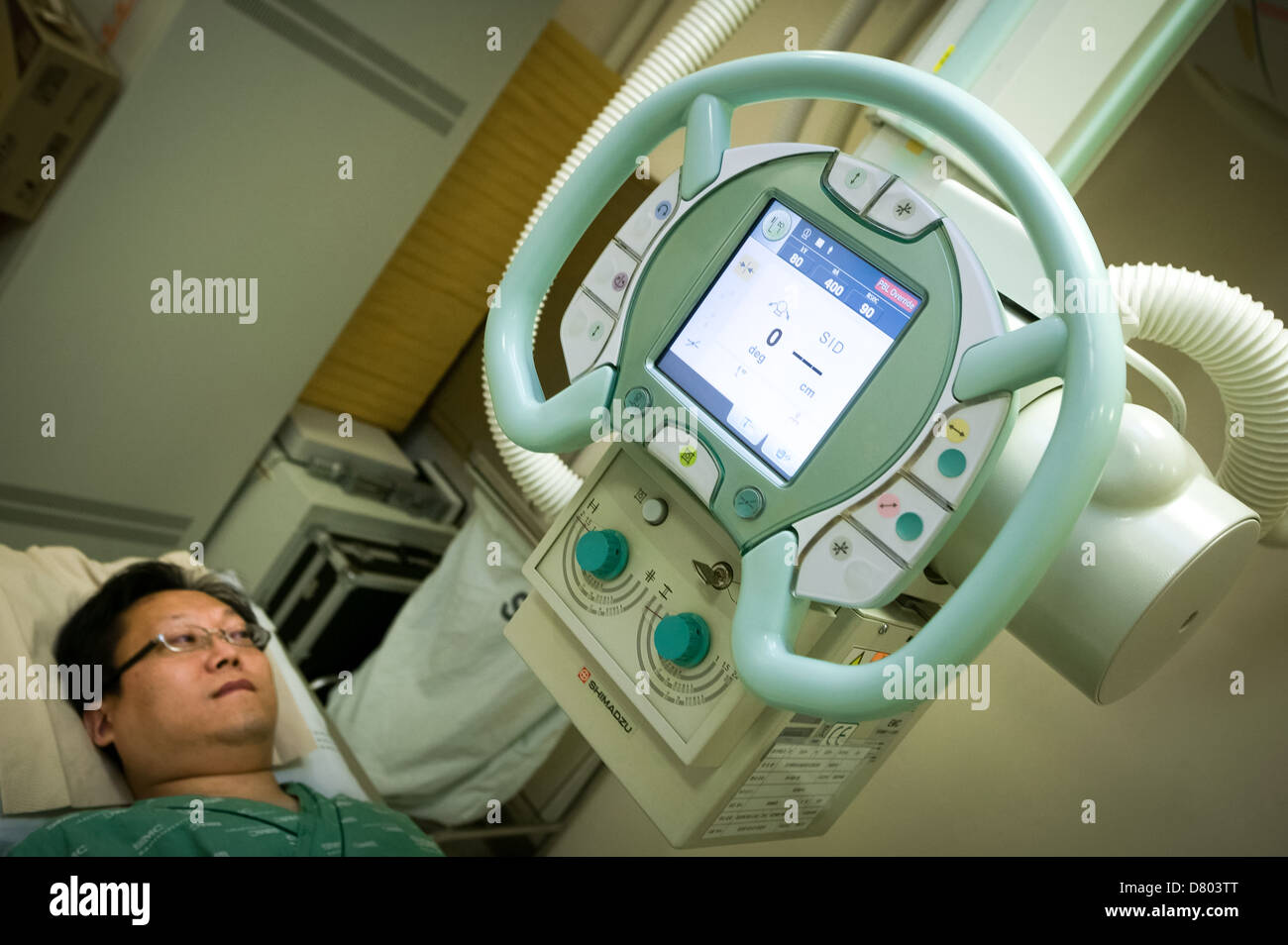 A patient is prepared for an X-ray. Stock Photo