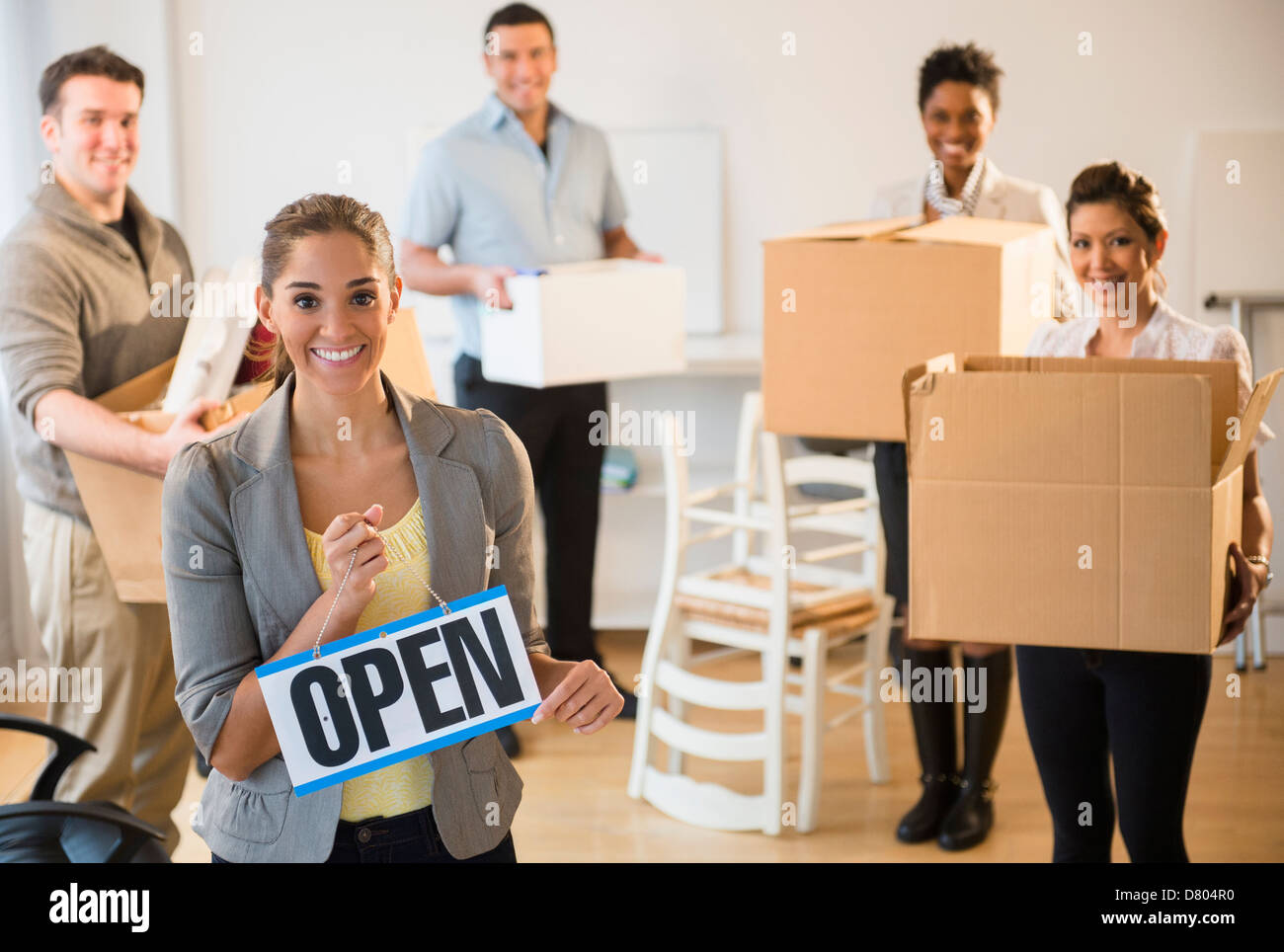 Business people opening new office Stock Photo Alamy
