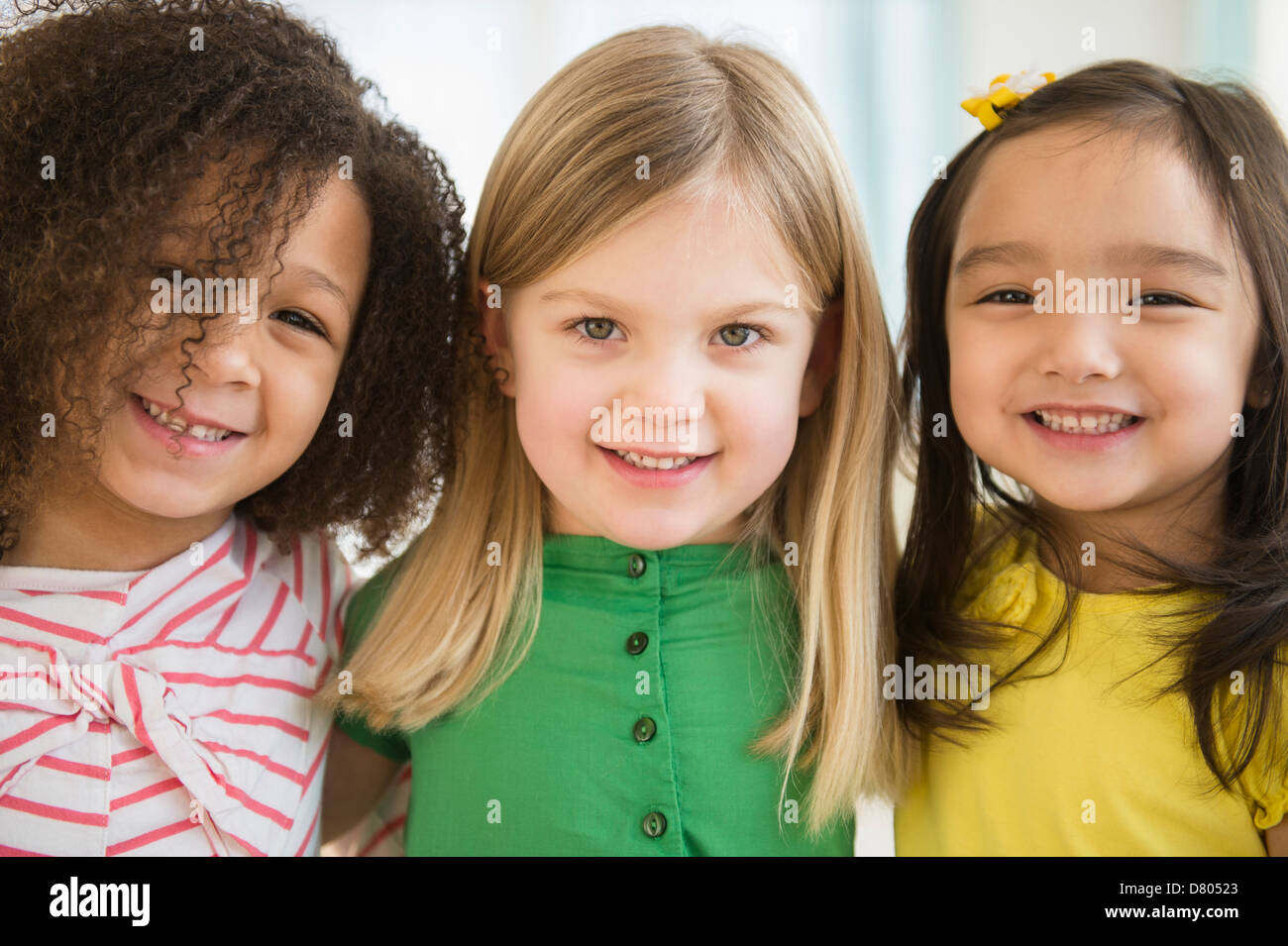 Girls smiling together Stock Photo