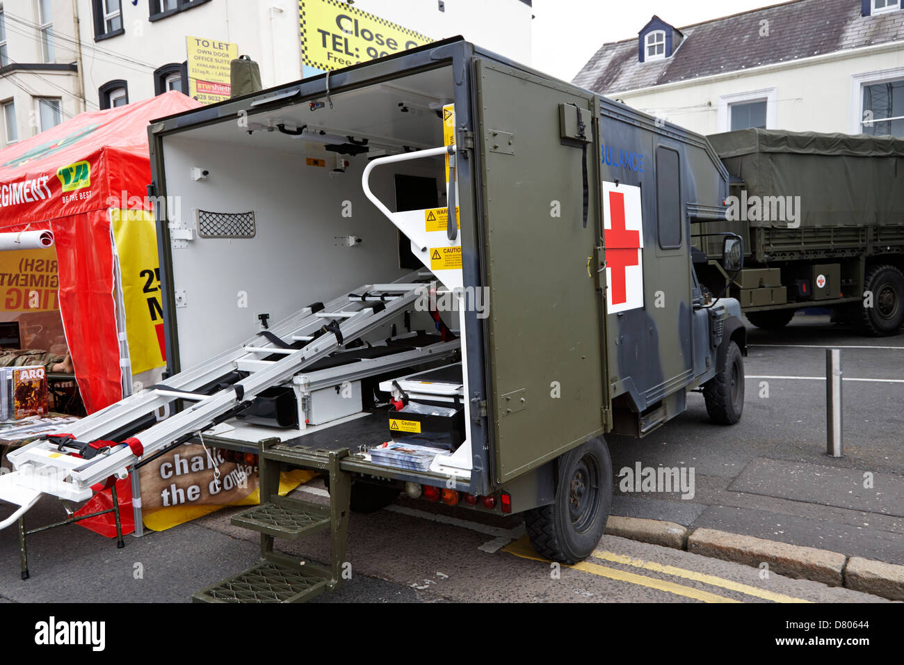 land rover battlefield ambulance at british army medical regiment recruiting stand at an outdoor event Stock Photo