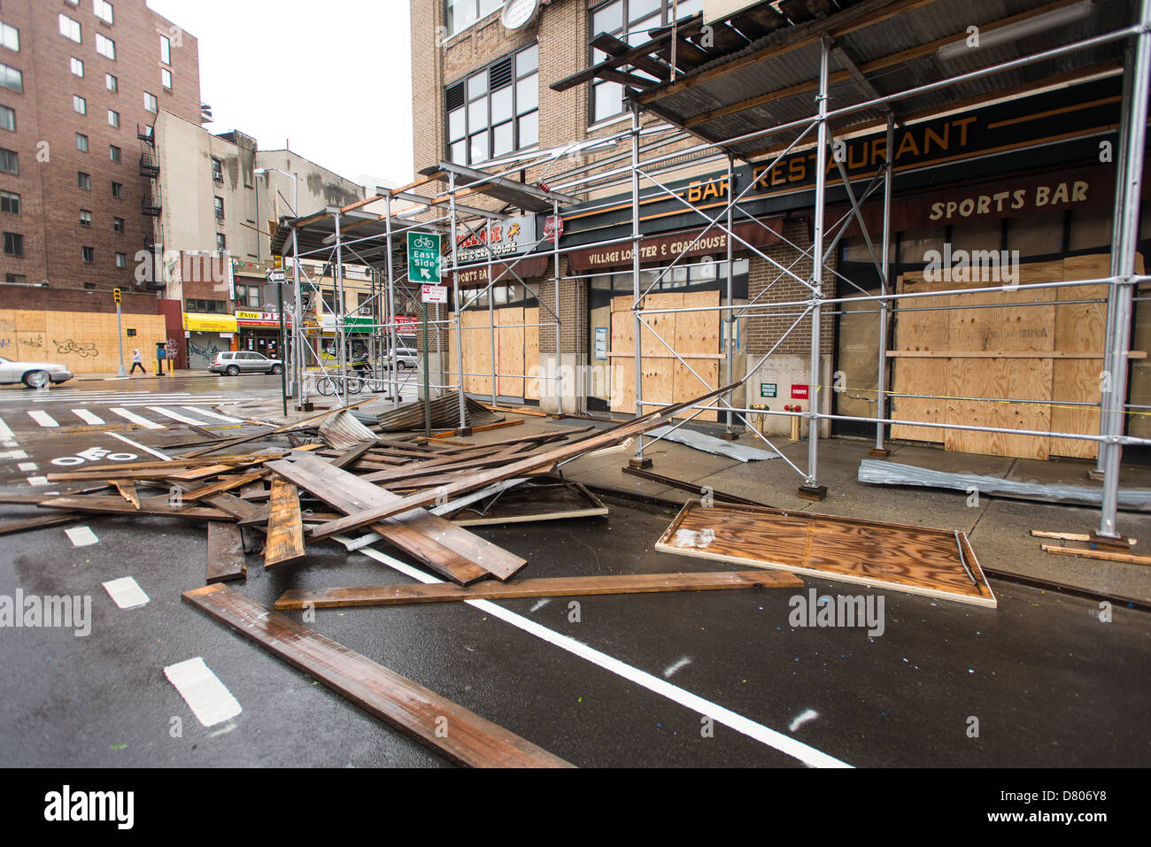 Effects of Hurricane Sandy. Destroyed scaffolding, near intersection of Varick St. and Carmine St. Manhattan, NYC, Oct 30, 2012. Stock Photo