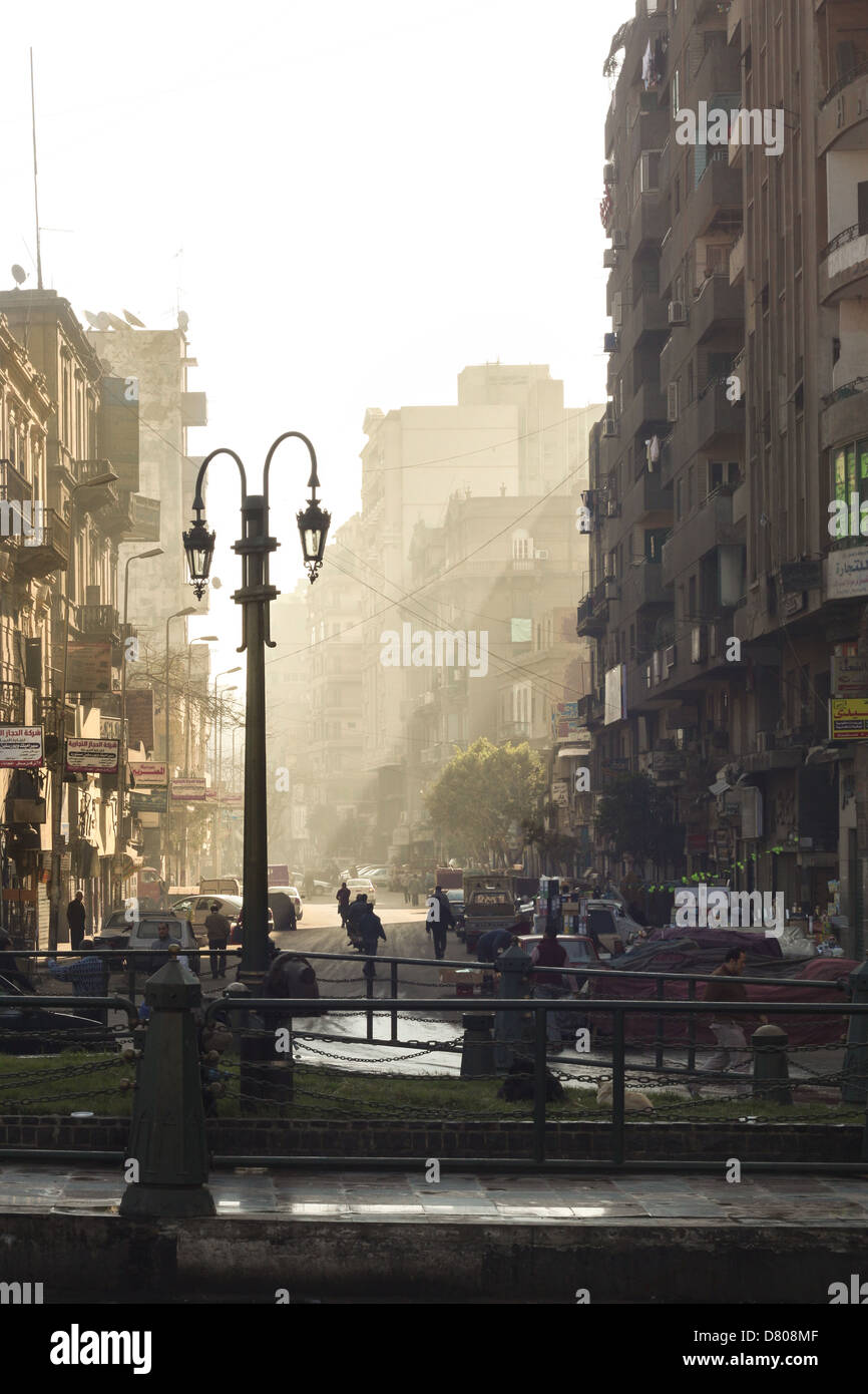 A picture shows morning Cairo, Before the hustle starts, the streets are filled by all kinds of smells and golden rays. Stock Photo