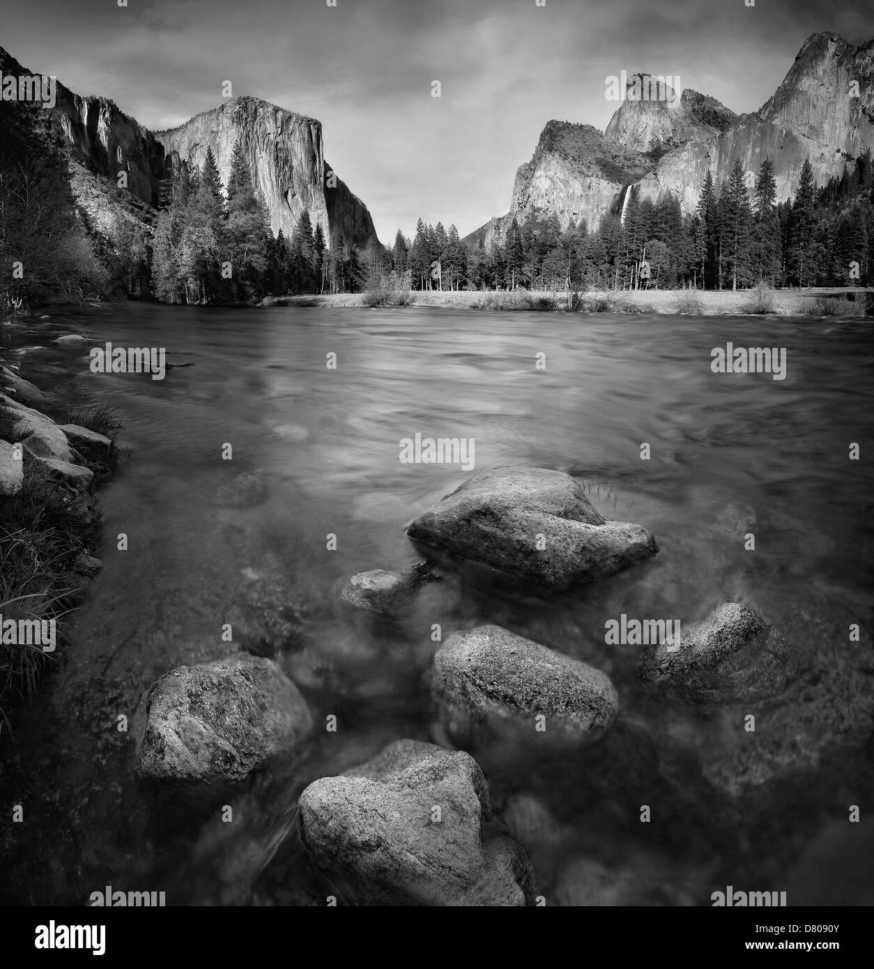 Blurred view of water rushing over rocks, Yosemite, California, United States Stock Photo