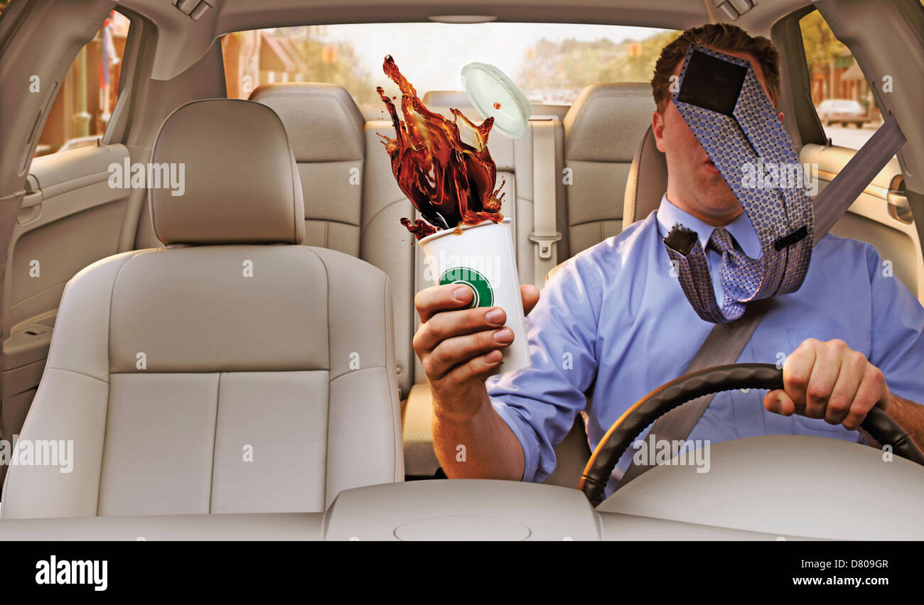 Man spilling coffee while driving Stock Photo Alamy