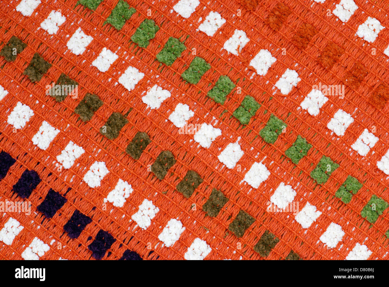 Hand woven carpet with nice abstract design. Stock Photo