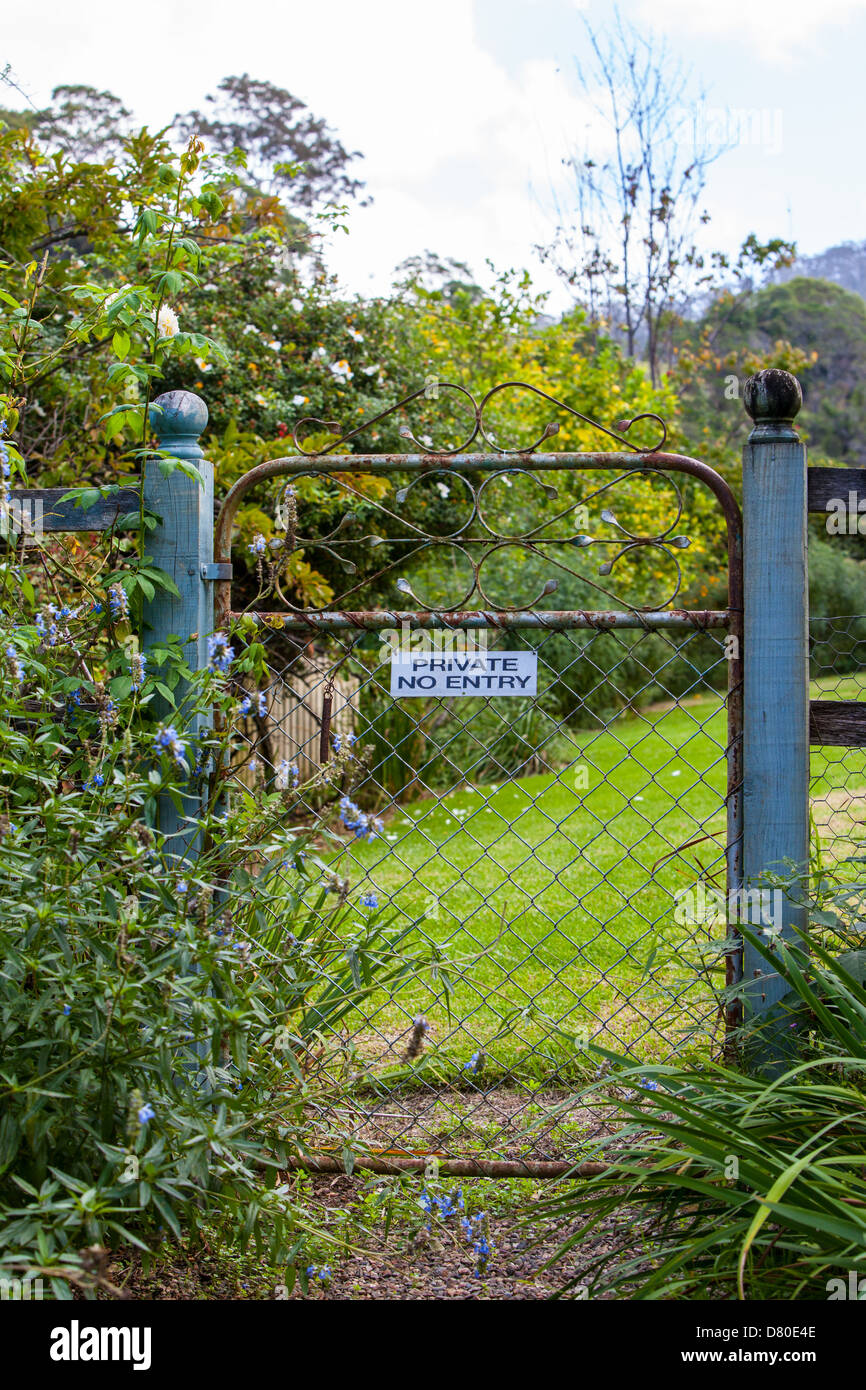 Metal gate with private property sign hi-res stock photography and ...