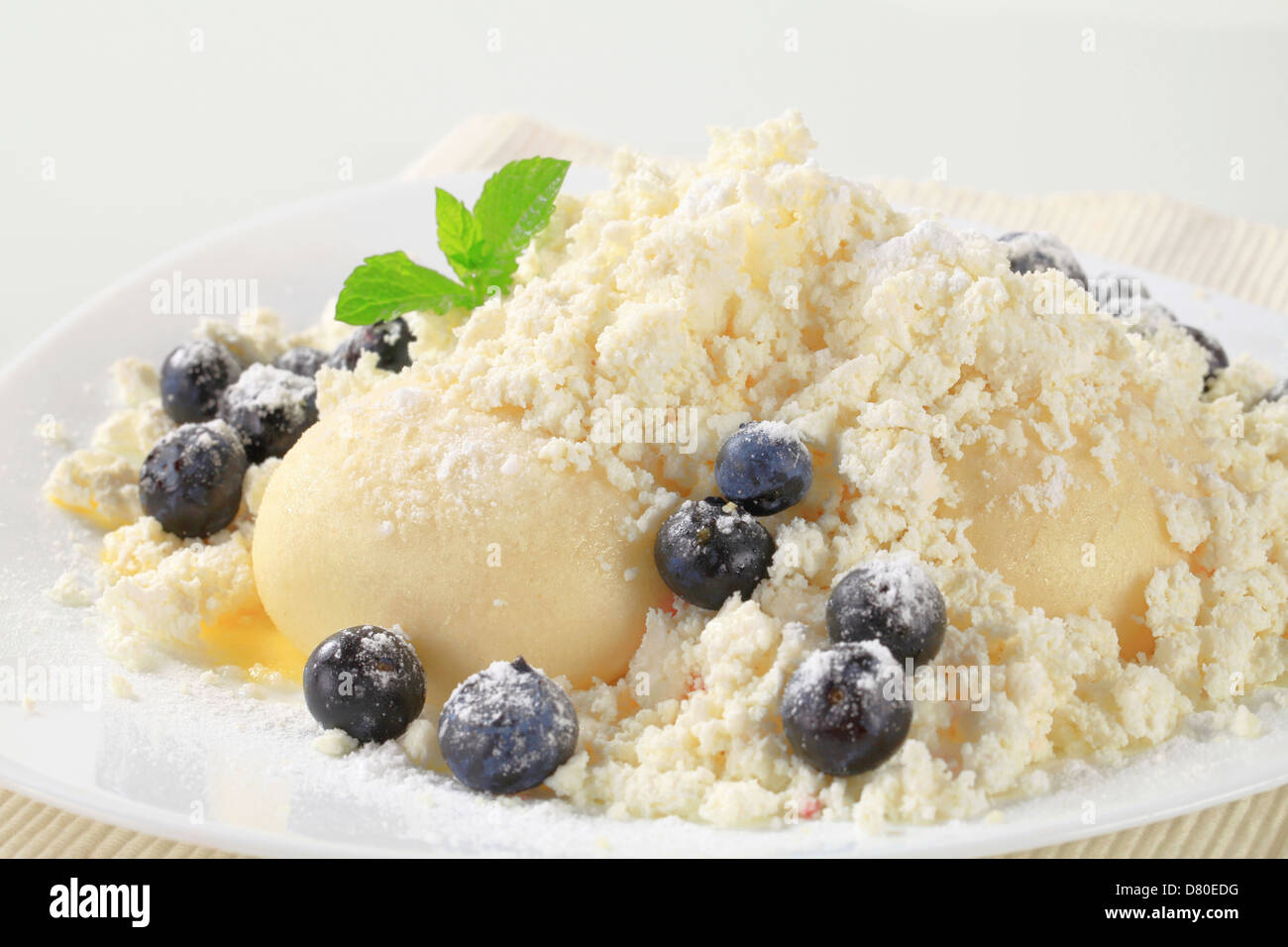 Blueberry Dumplings With Cottage Cheese Sugar And Butter Stock