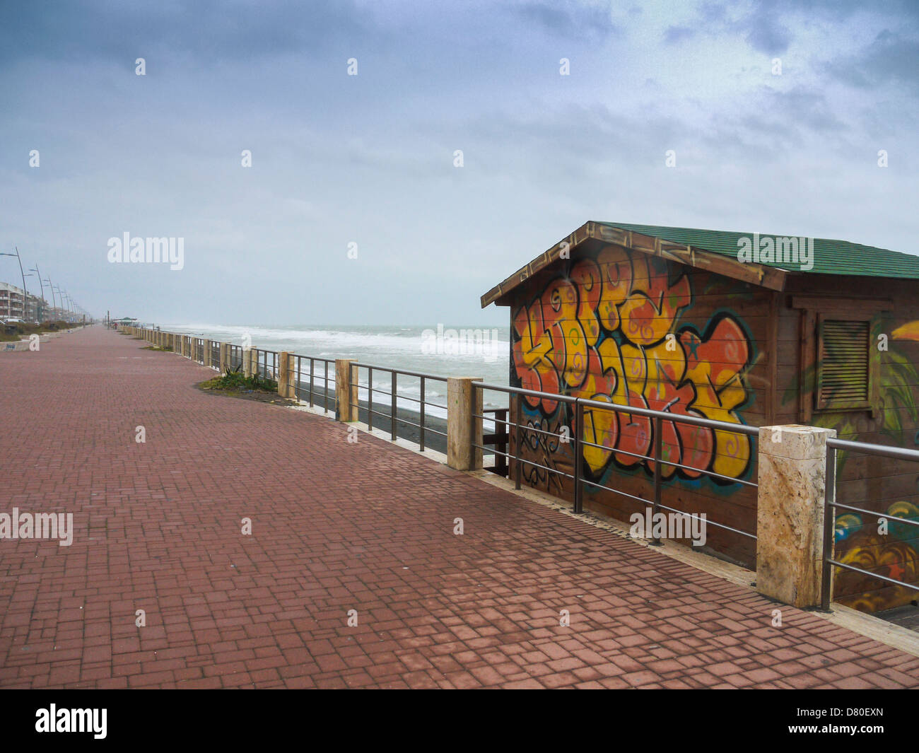 colorful small wooden house on the beach in winter time Stock Photo
