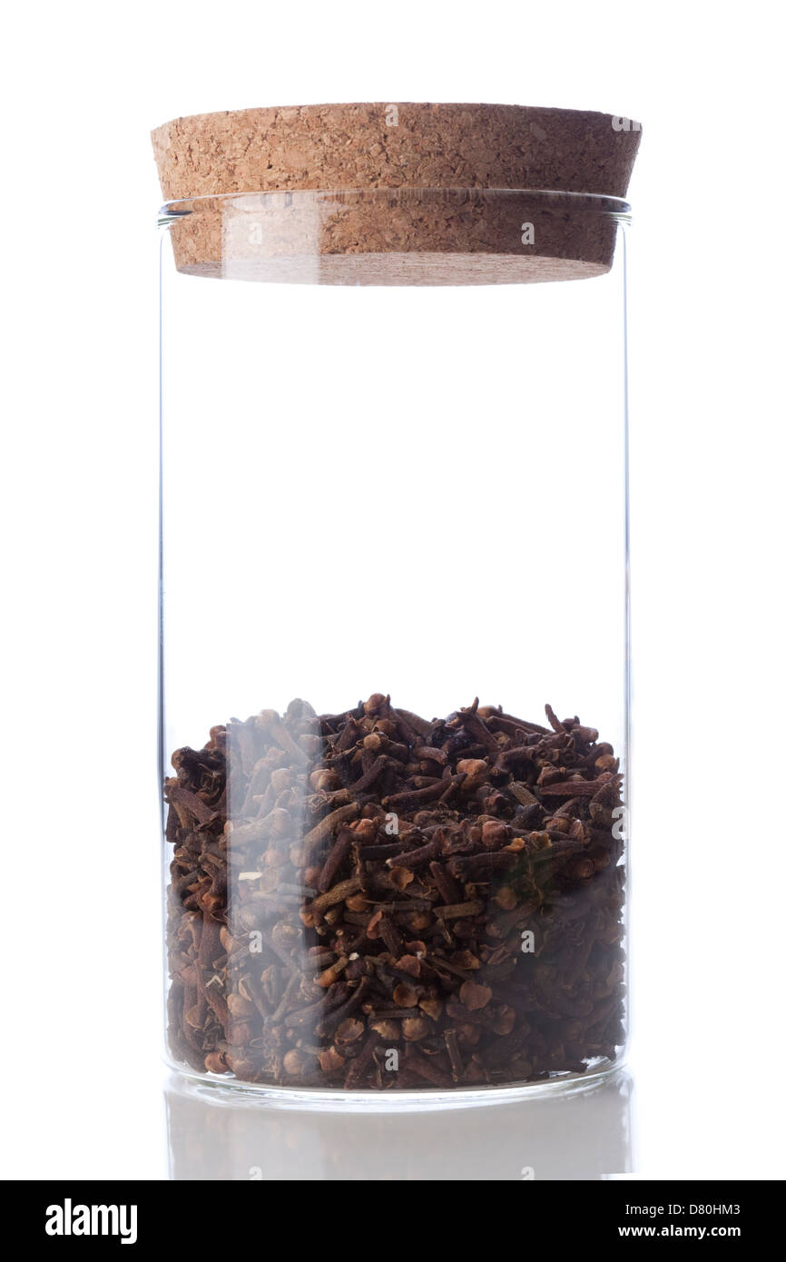 Chinese medicinal herb cloves in glass bottle Stock Photo Alamy