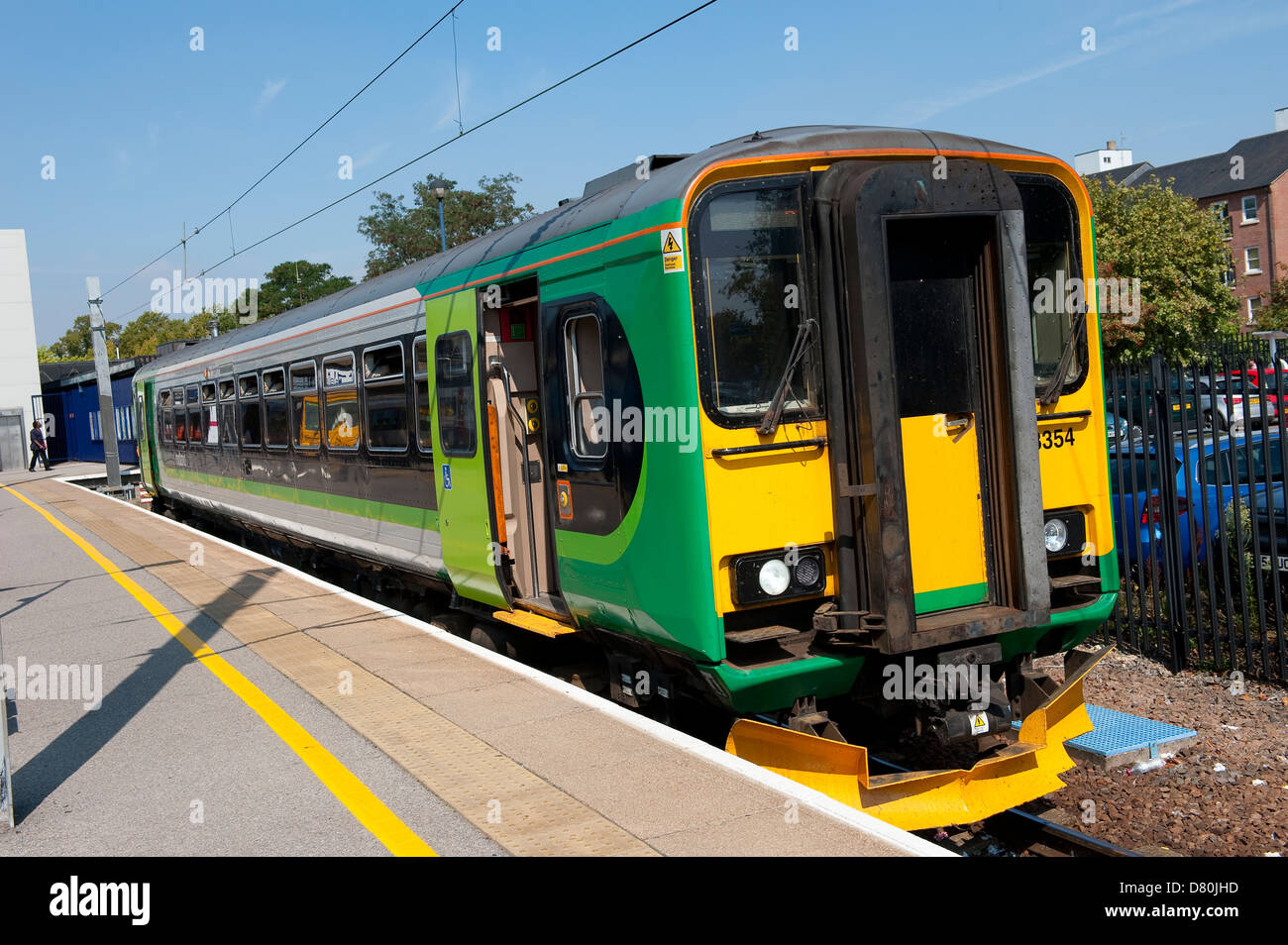 Passenger train in London Midland livery waiting at the railway station ...