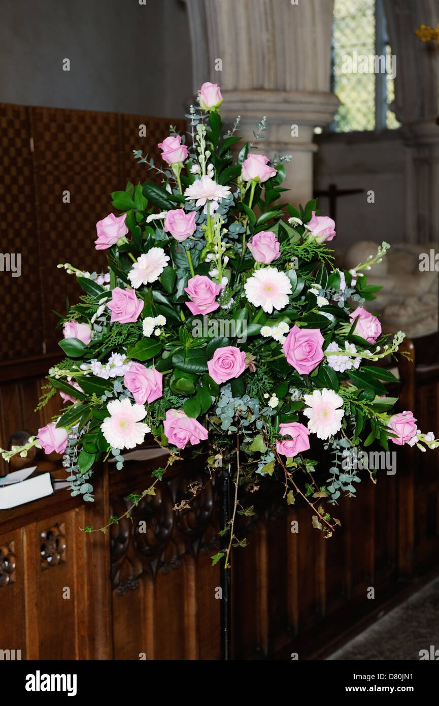 Flower arrangement decorates church on wedding day Stock Photo Alamy