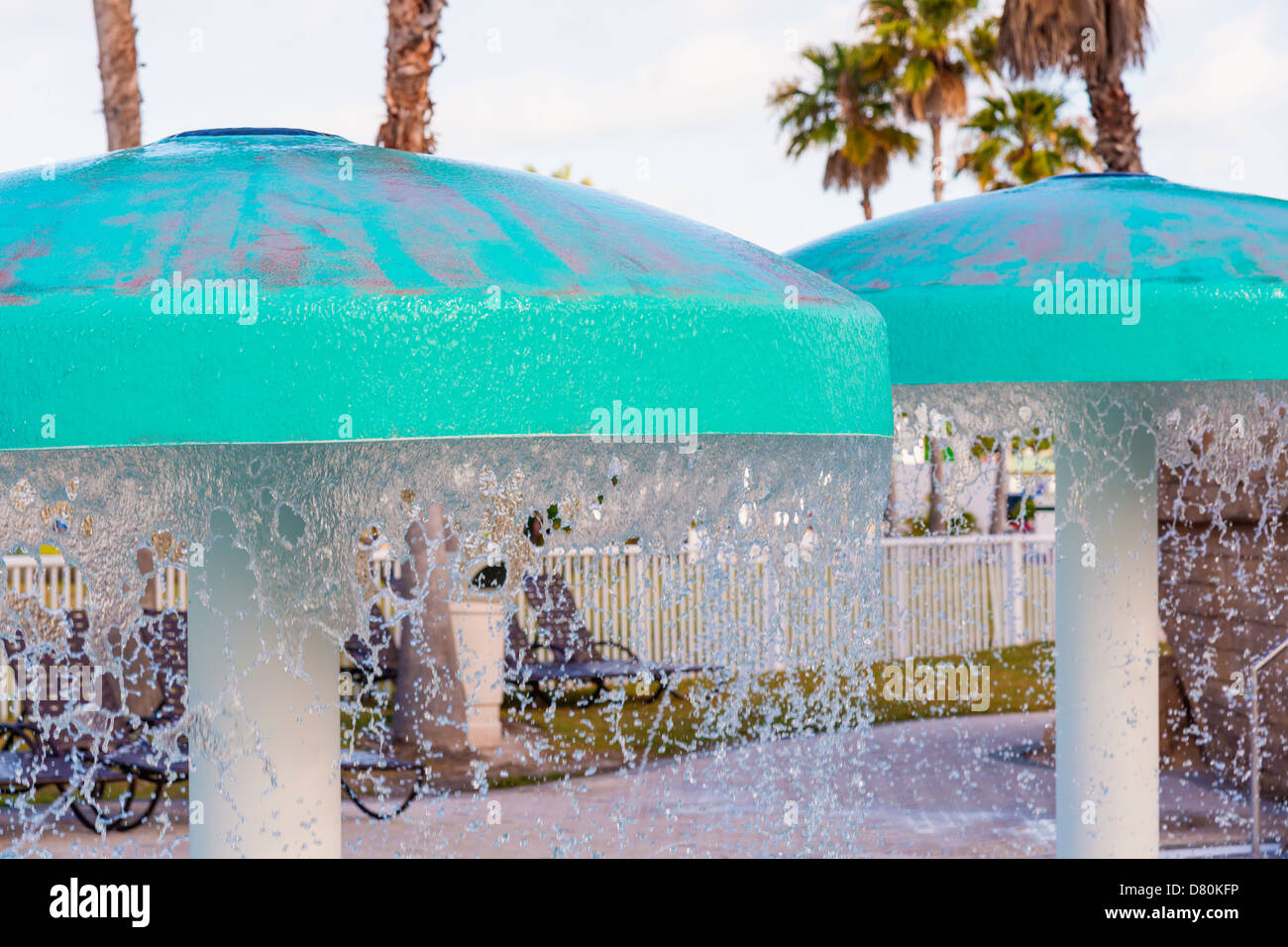Swimming pool area with mushroom water fountains, Holiday Inn hotel