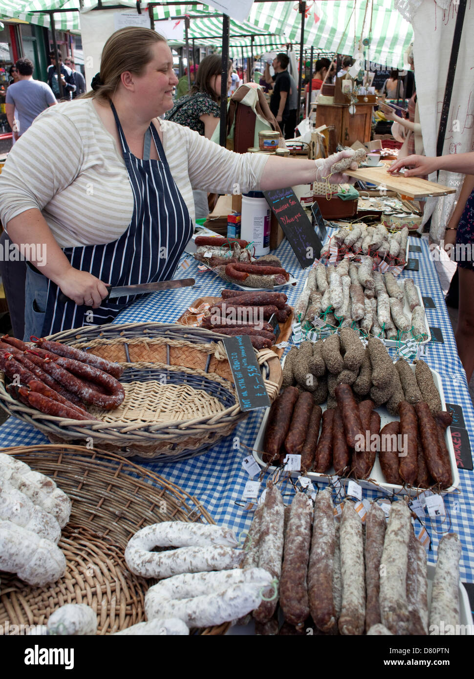 DRY CURED SAUSAGE STALL. SCENES AND STALLS FROM BROADWAY FOOD MARKET
