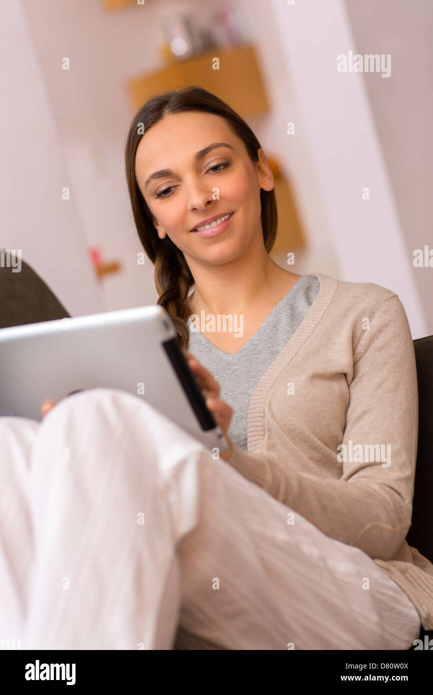 female consults email on pad Stock Photo