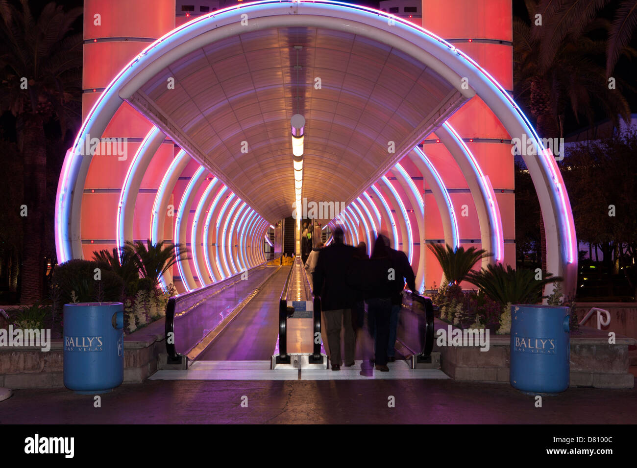 Moving sidewalk entrance to Monorail station entrance at Bally's casino at night-Las Vegas, Nevada, USA. Stock Photo