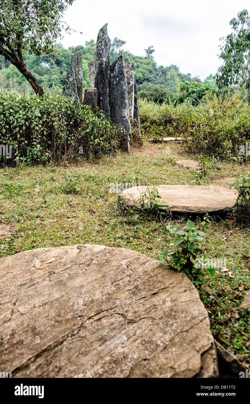 Propper Rocks Disks SAM NEUA, Laos — Flat stone disks lie before a cluster of jagged ...