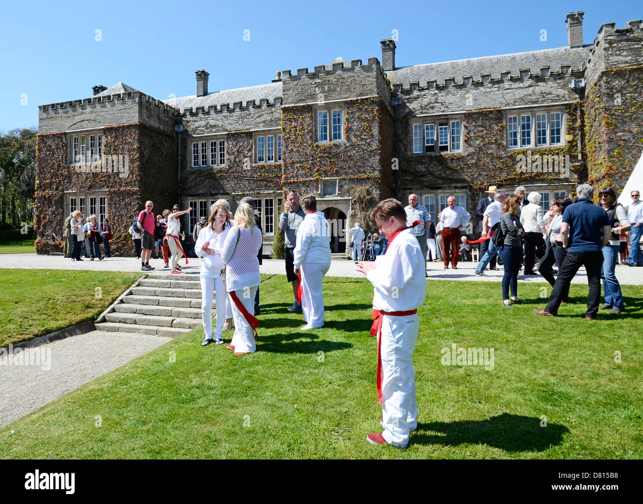 Obby Oss day at Prideaux Place in Padstow, Cornwall, all of the townsfolk are invited to rest on the lawns during the parade. Stock Photo