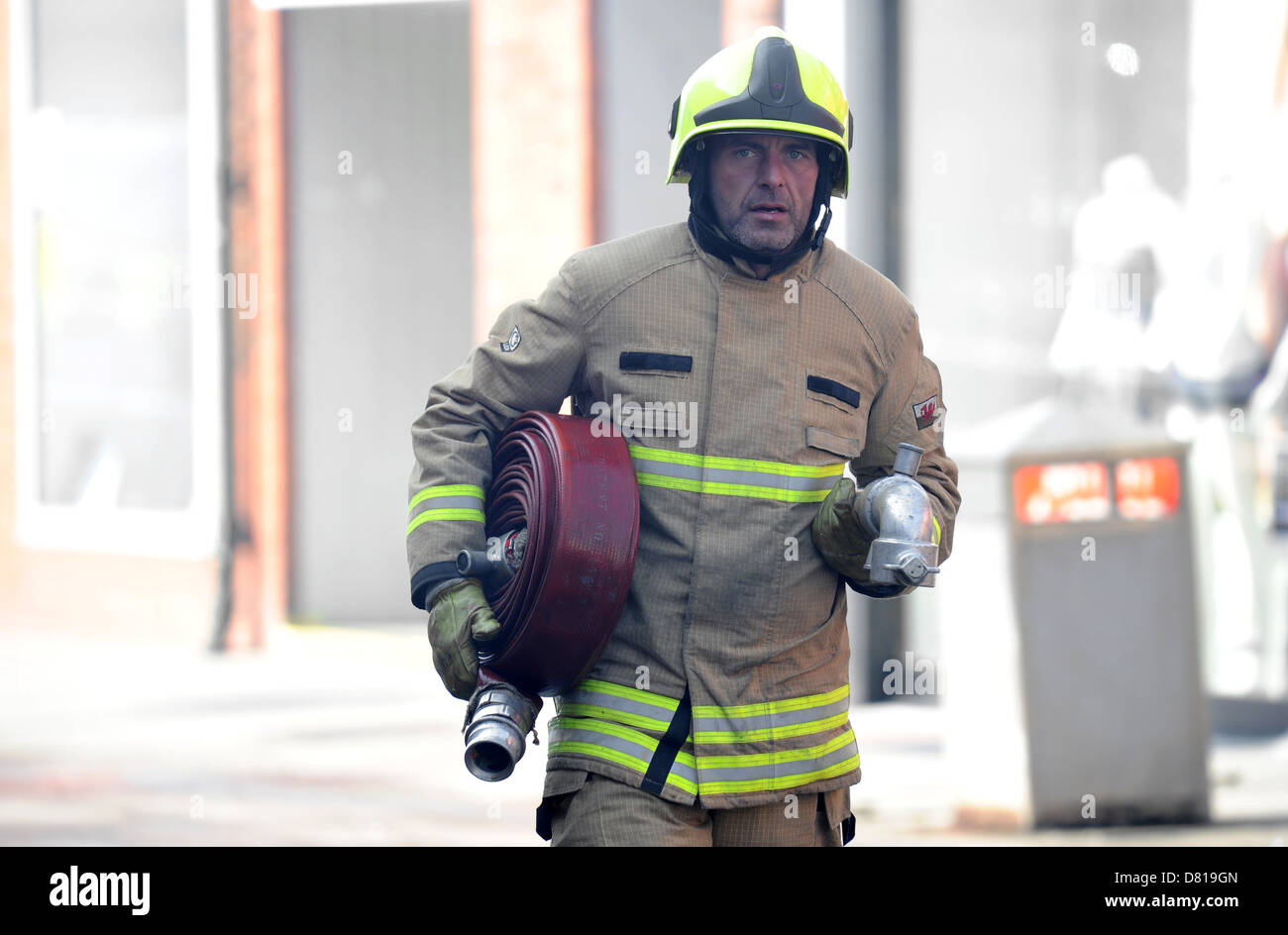 A South Wales firefighter in action. Stock Photo