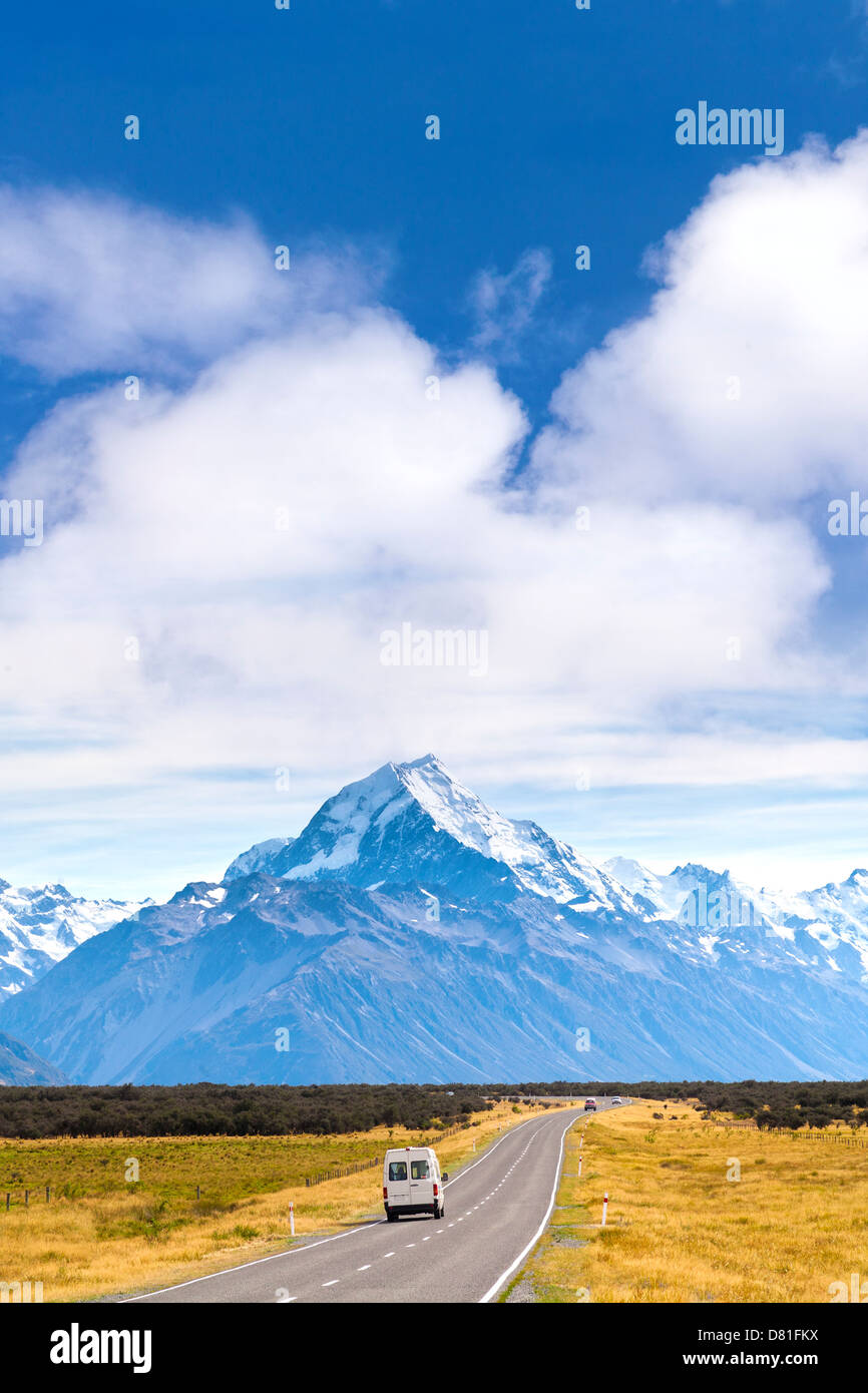 Mount Cook and Campervan - campervan on the road, heading towards Mount Cook, New Zealand's highest mountain. Stock Photo